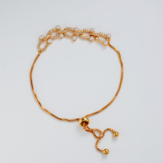 Locked In Elegance Gold And Pearl Bracelet